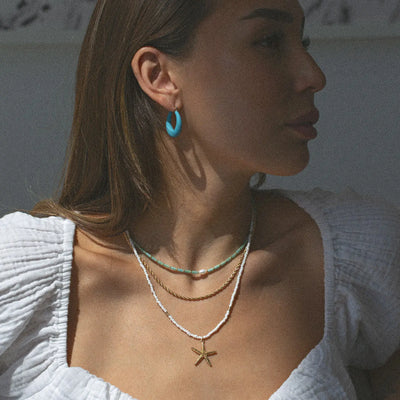 Ellie - Sjöstjärna Halsband med Vita Pärlor